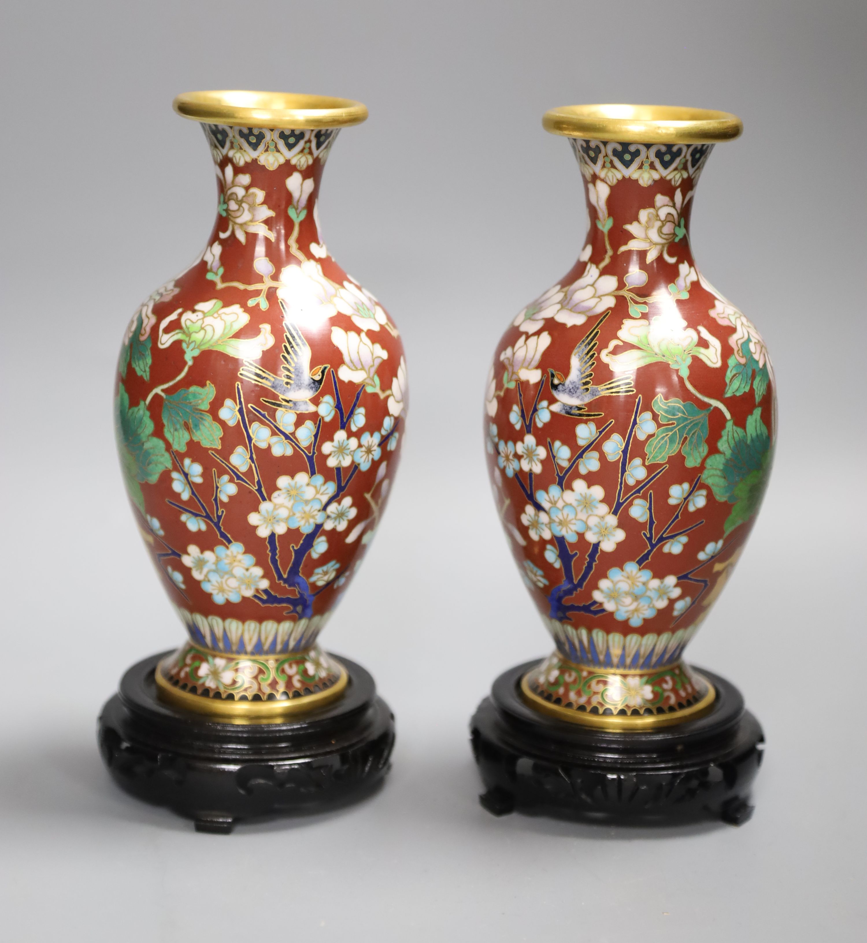 A pair of Chinese cloisonne vases, height 18cm